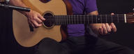 This image shows a LCT 140 small diaphragm condenser microphone on a Martin acoustic guitar